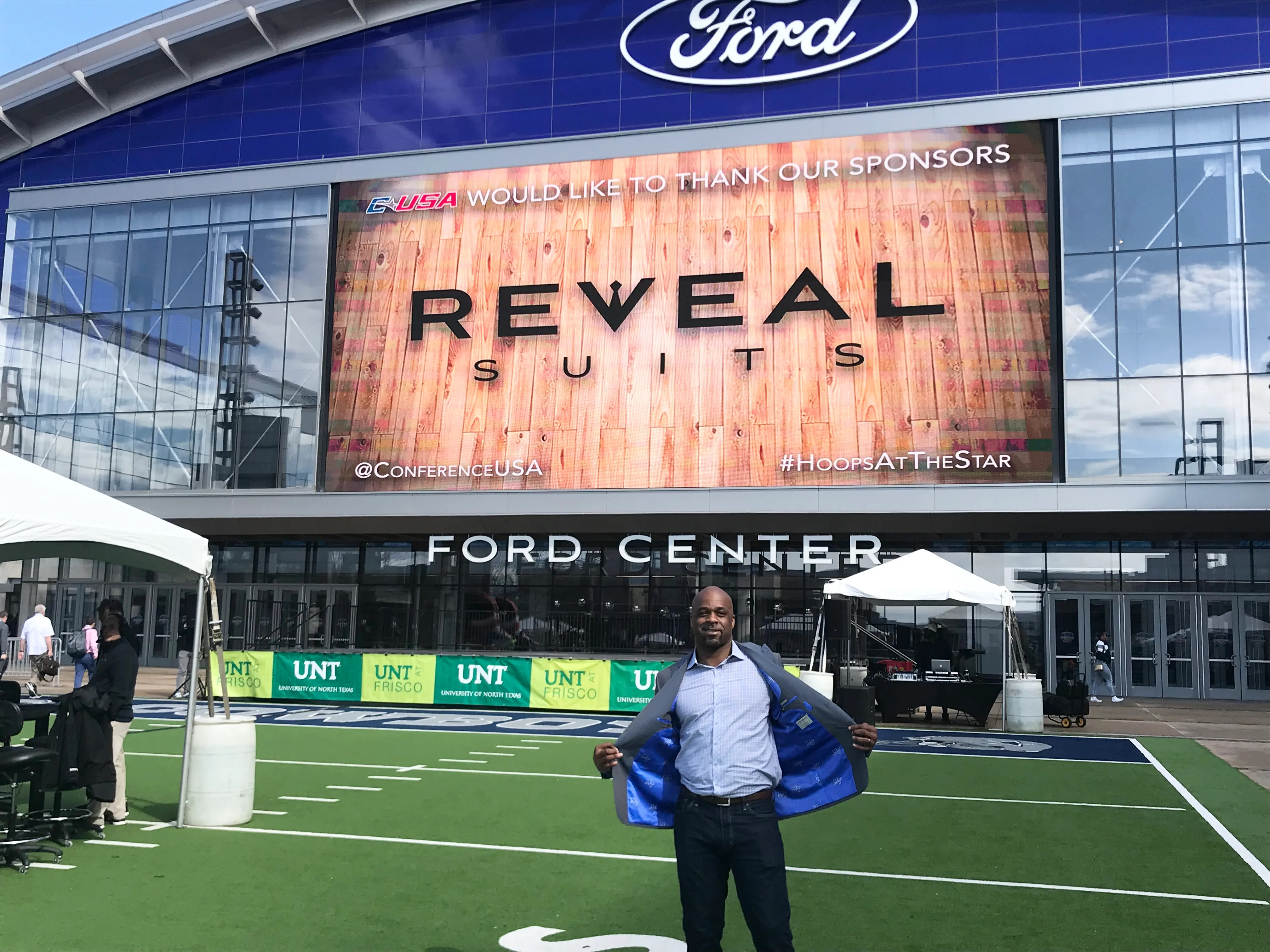 Cartlon using Reveal Blazer in from of Ford Center stadium.
