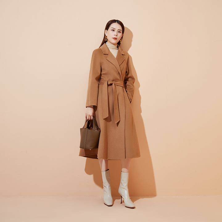 Woman using brown coat