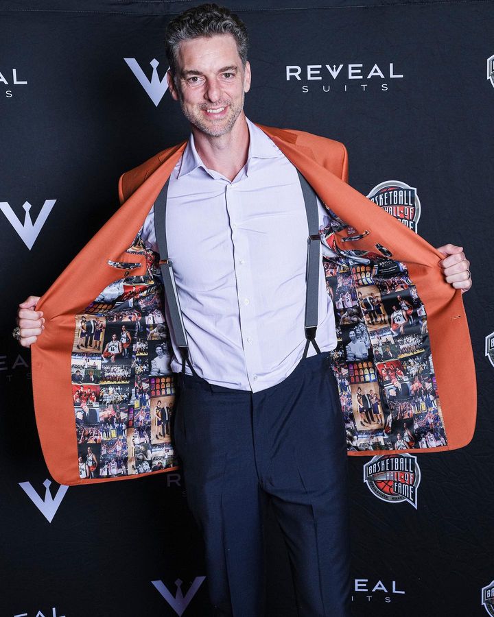 Man wearing a Reveal Blazer with a multiple photo lining